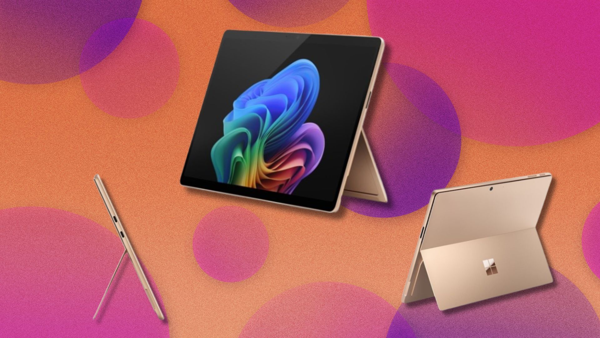 the microsoft surface pro 11 displayed on a pink and orange background