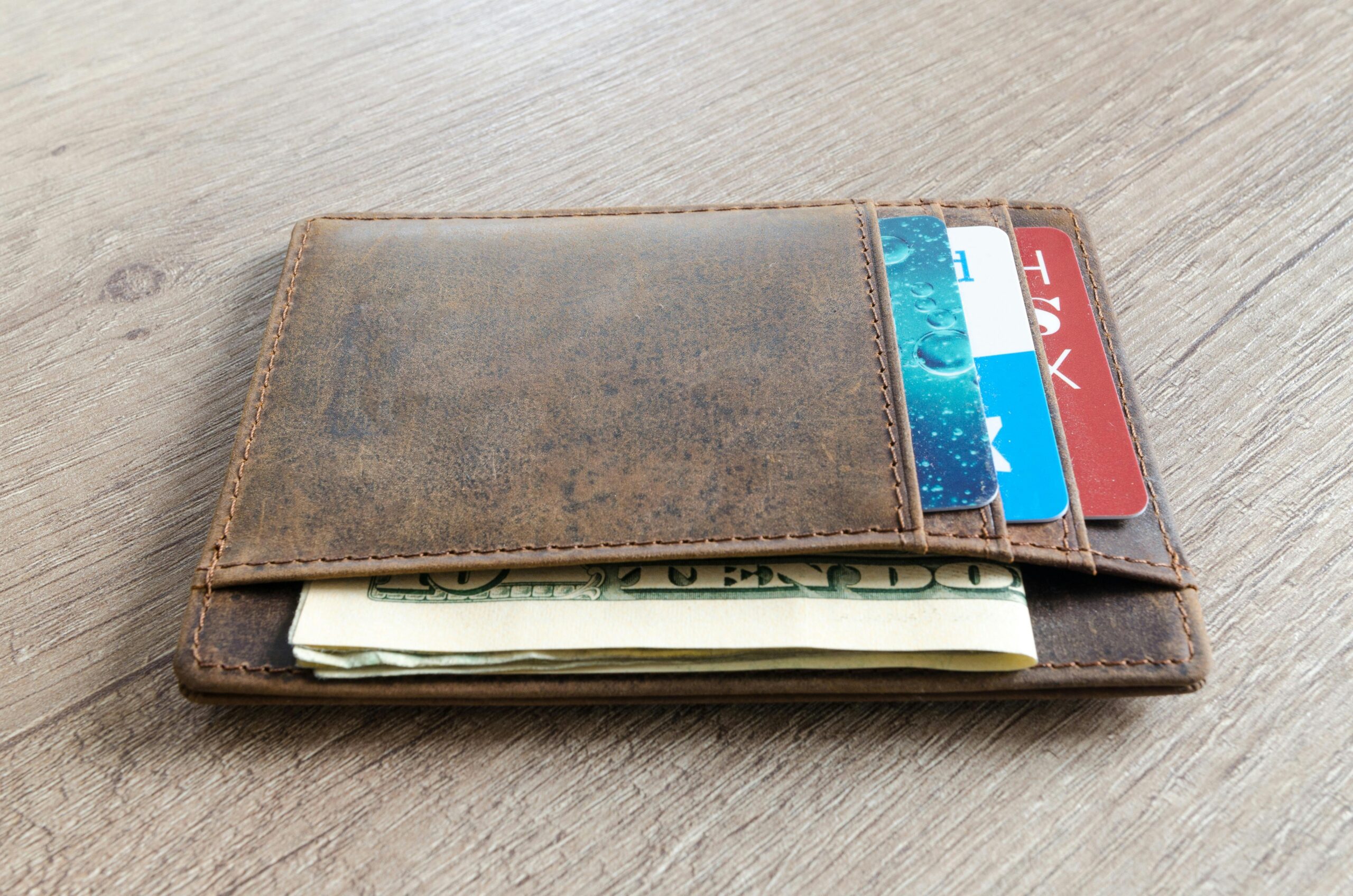 an overstuffed leather wallet