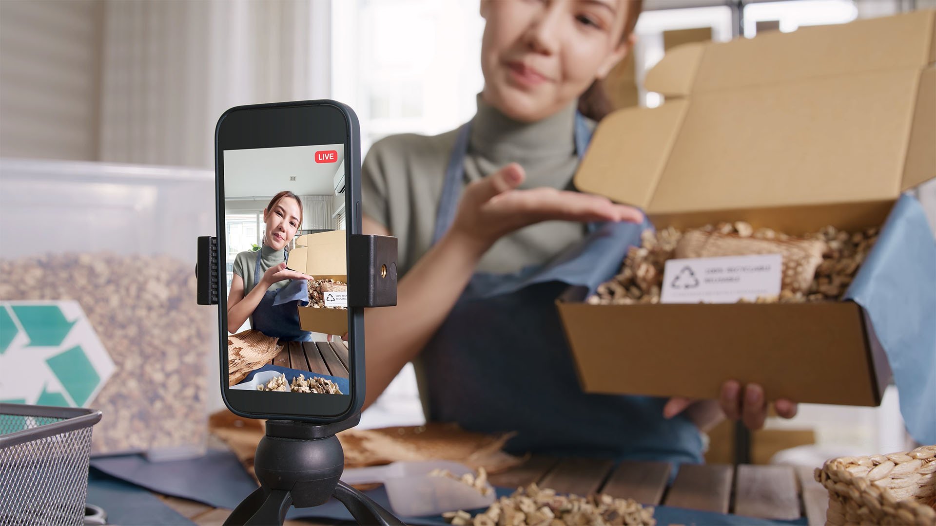 woman recording a video with smartphone