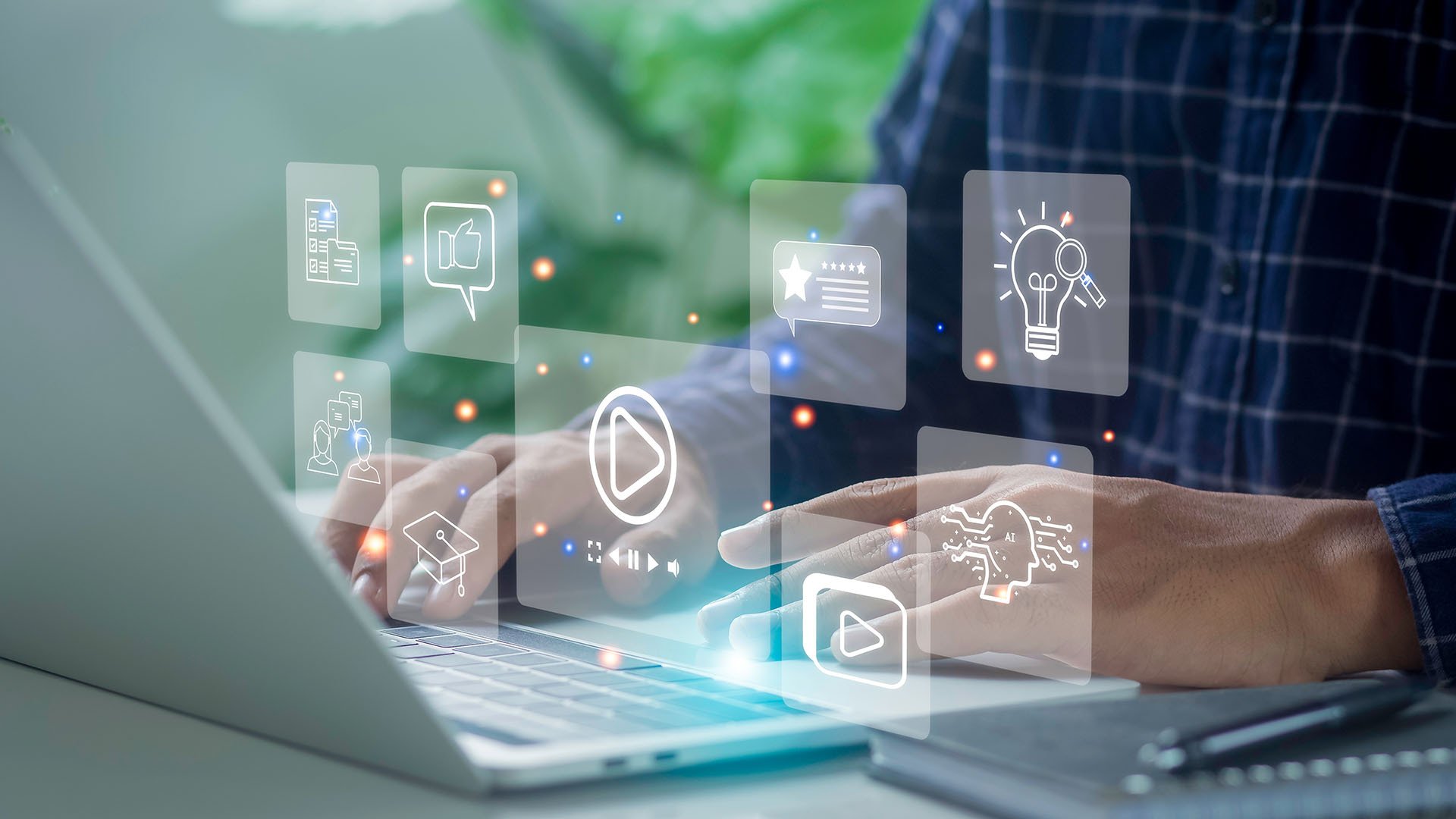 graphics of AI tools over a laptop