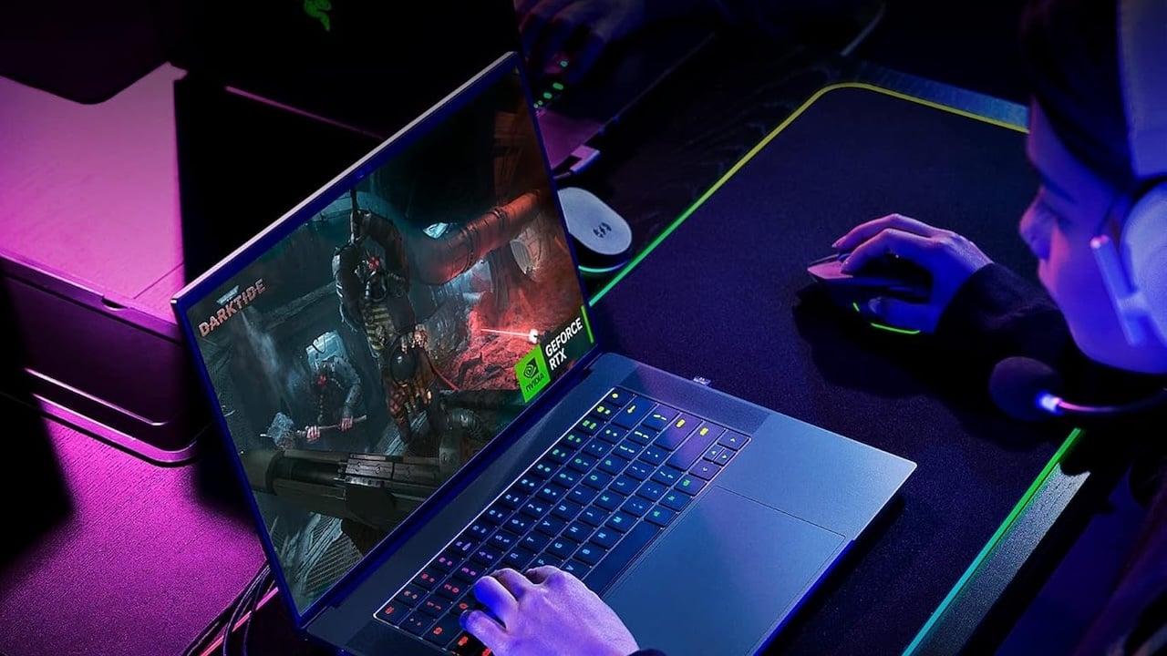 Person using Razer Blade 16 gaming laptop