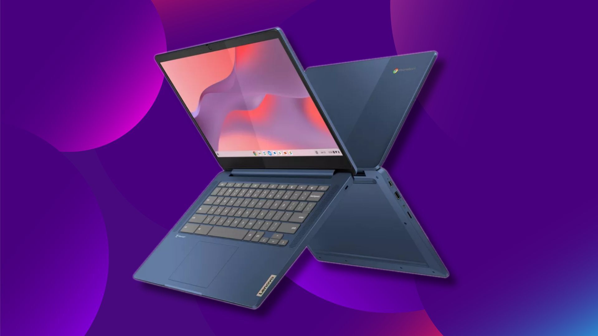 two blue lenovo slim chromebooks opened and facing back to back on a purple background