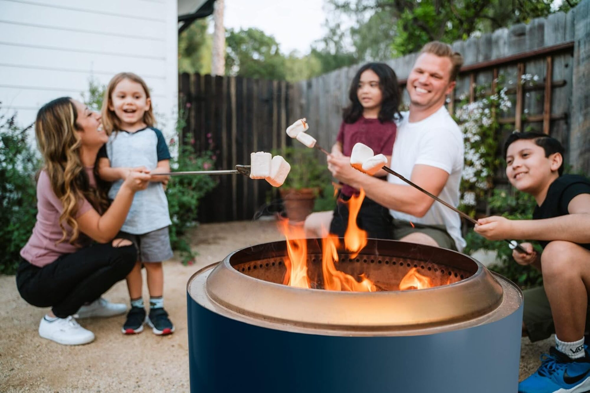 family roasting marshmallows