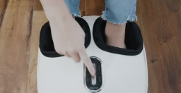 person using foot massager