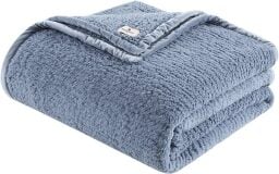 folded woolrich blanket in blue