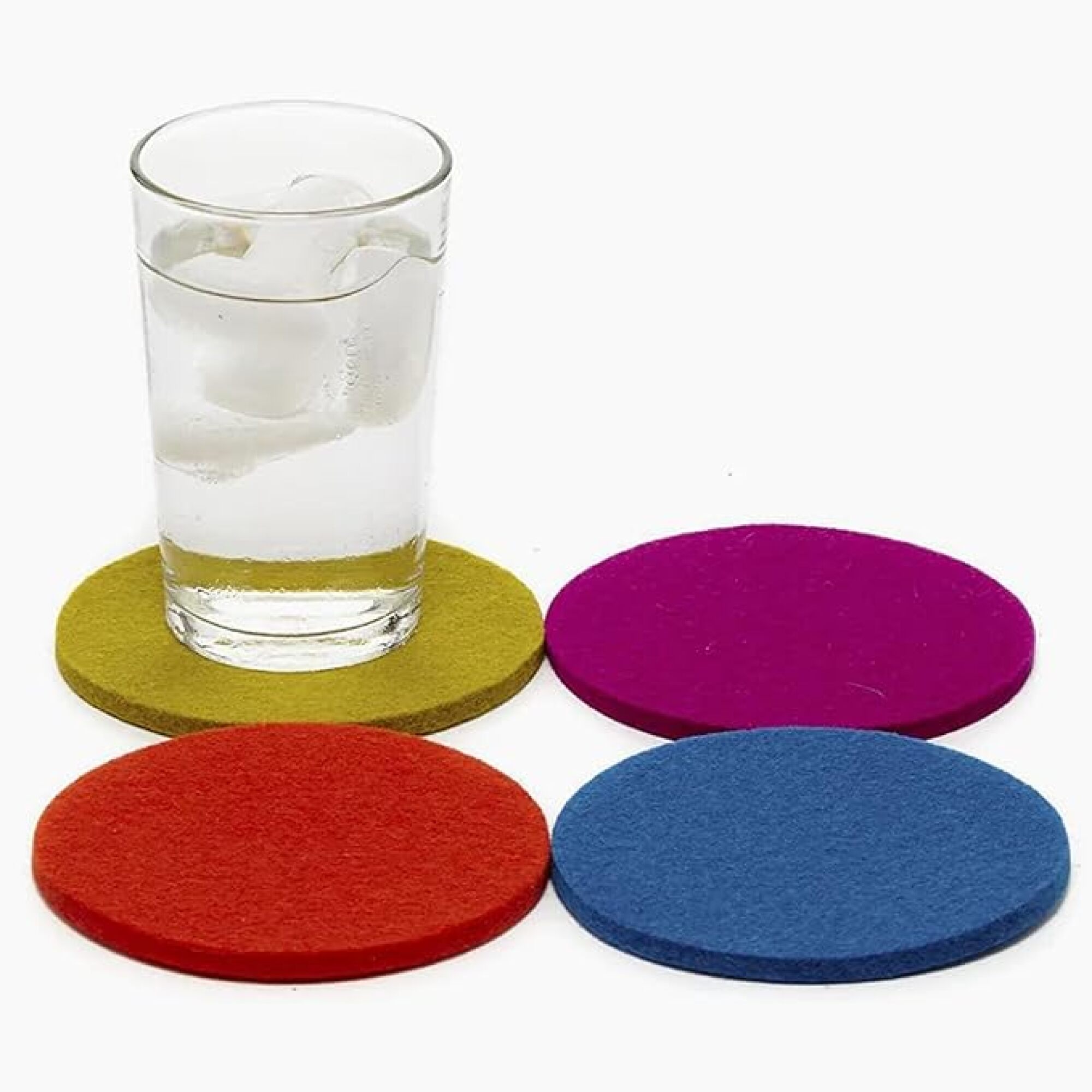 four coasters and a glass