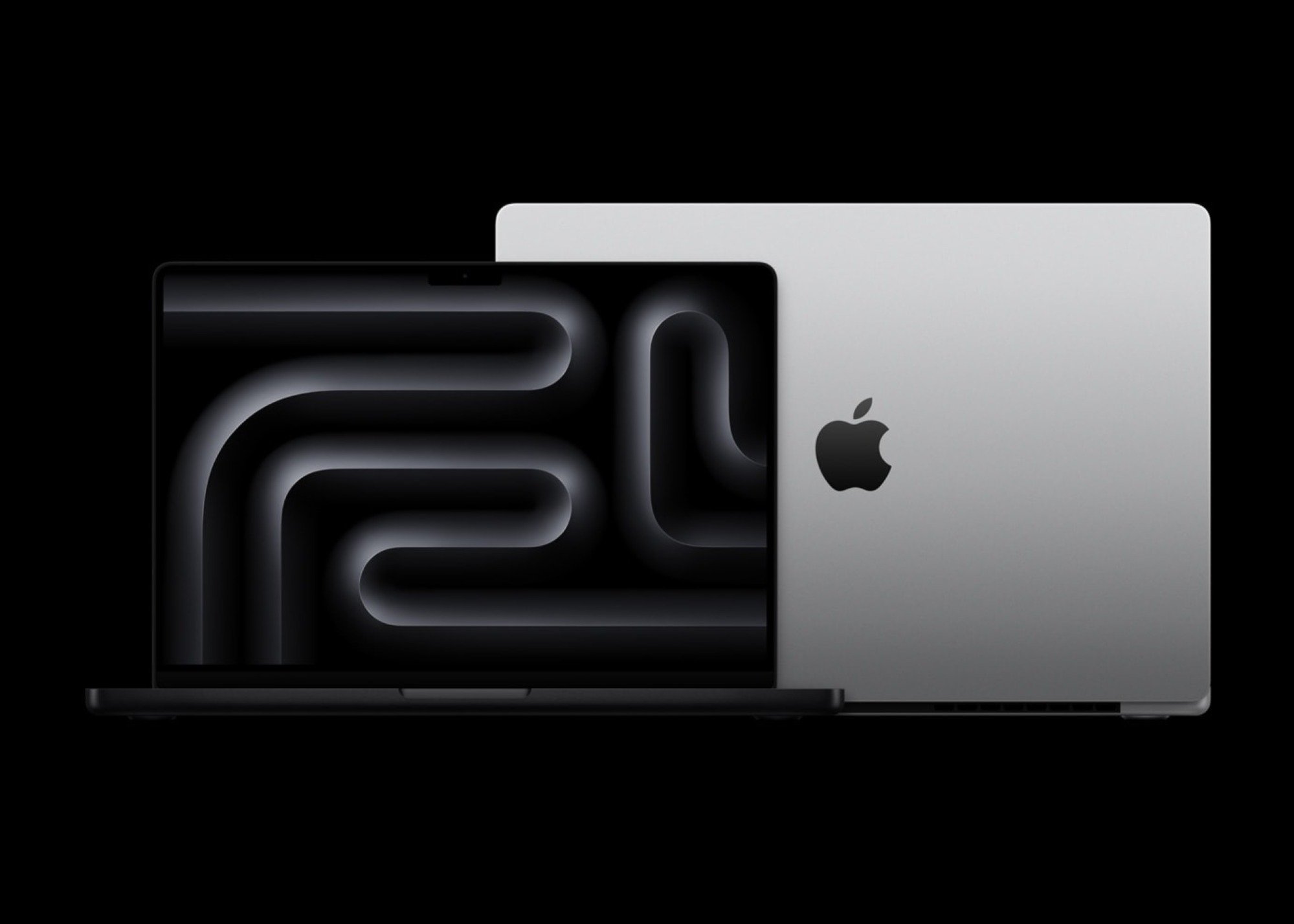Promo image of new M4 MacBook Pro models