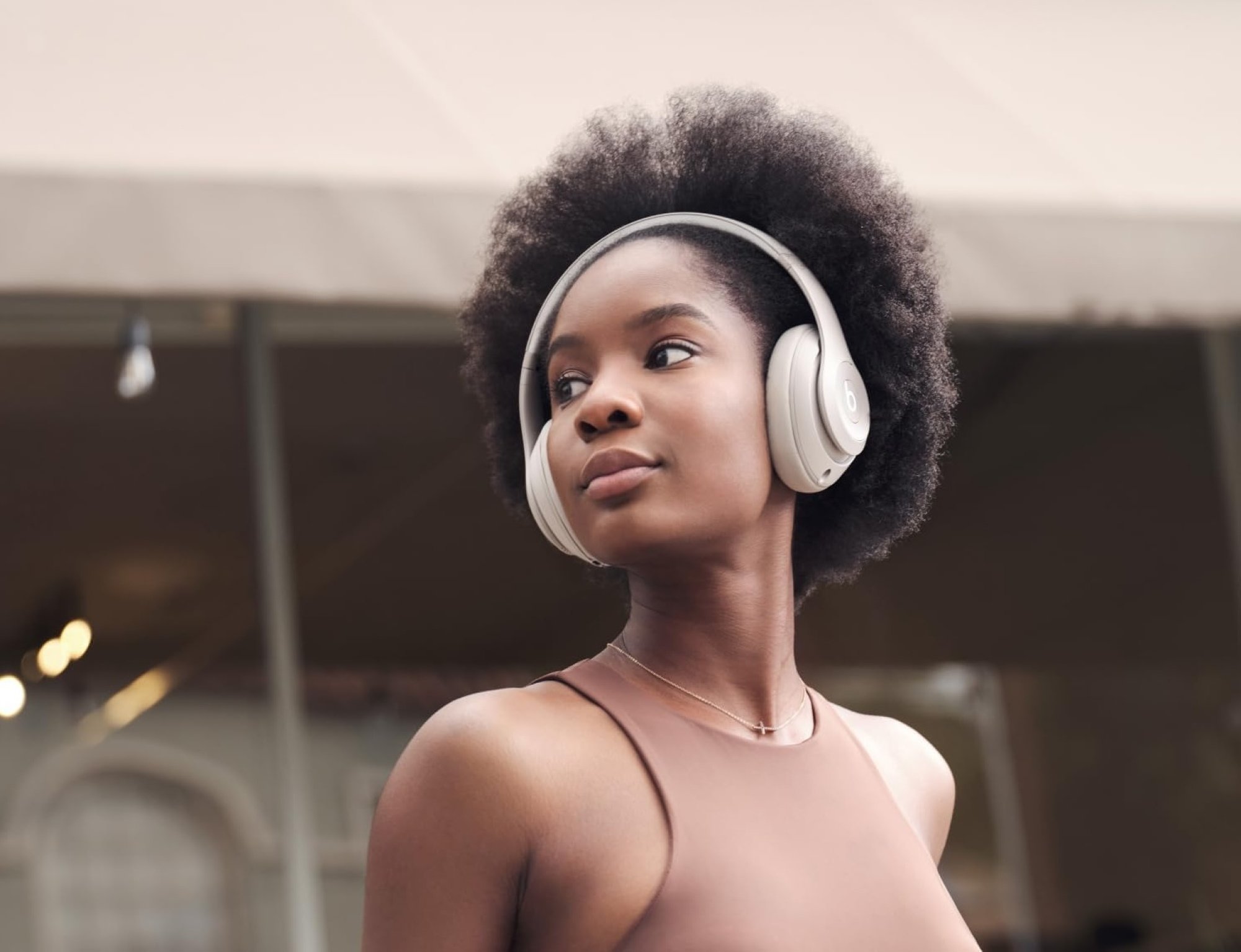 woman wearing beats headphones