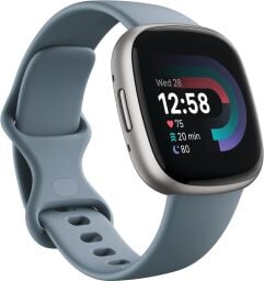 a blue fitbit versa 4 watch