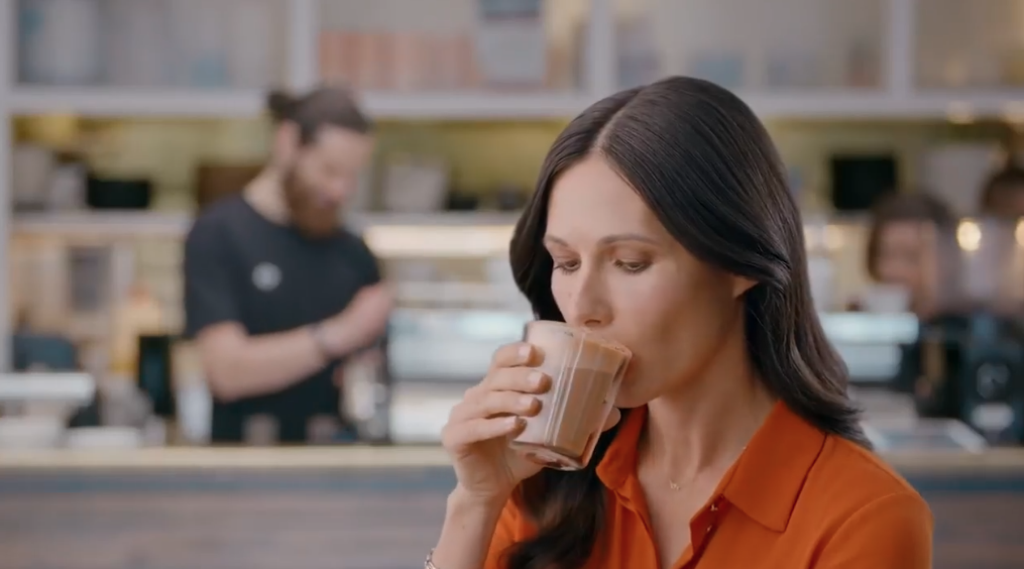 woman drinking coffee