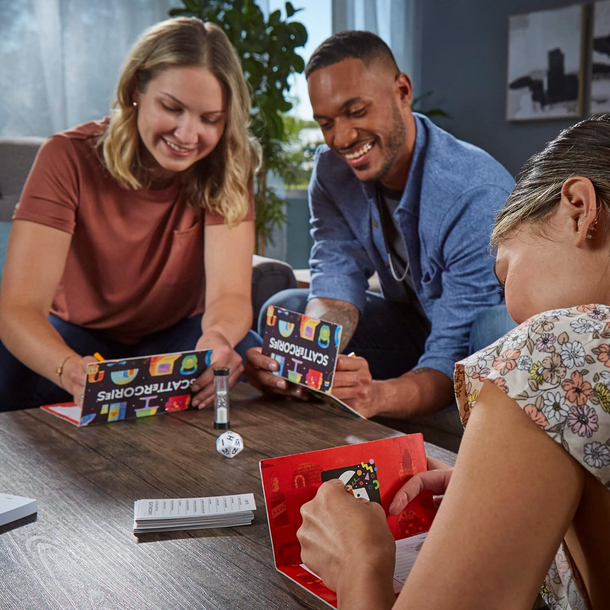 three people playing scattergories