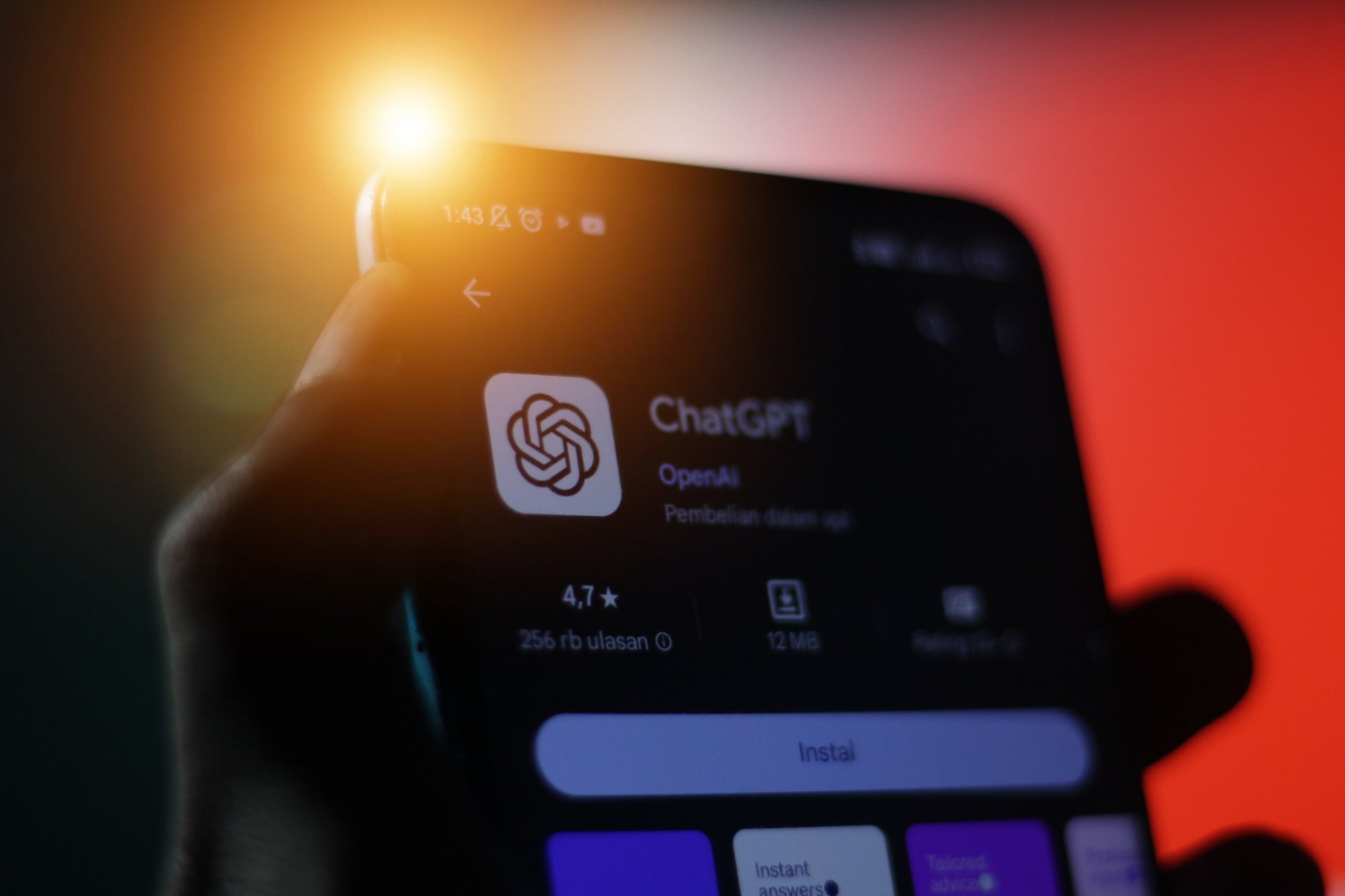 A blurry image of ChatGPT on a mobile device