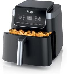 air fryer with fries in it