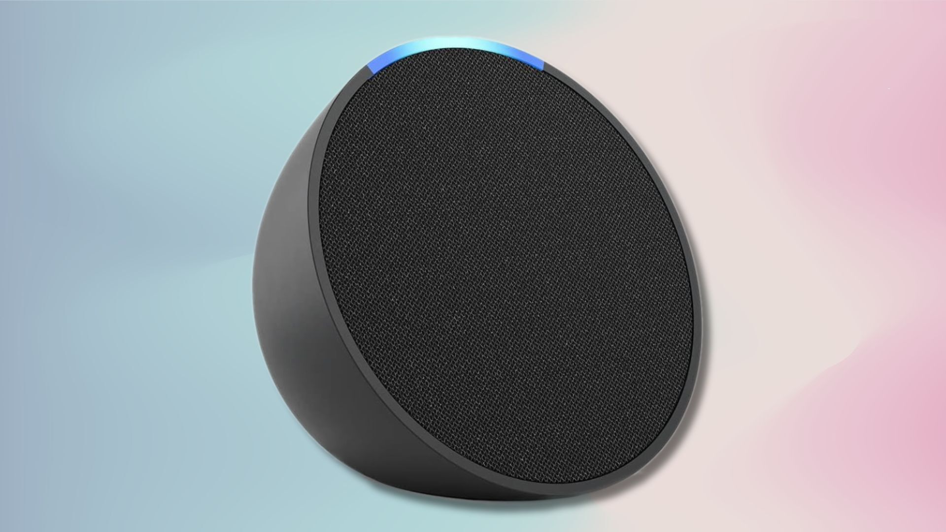 charcoal amazon echo pop on a light blue and light pink gradient background