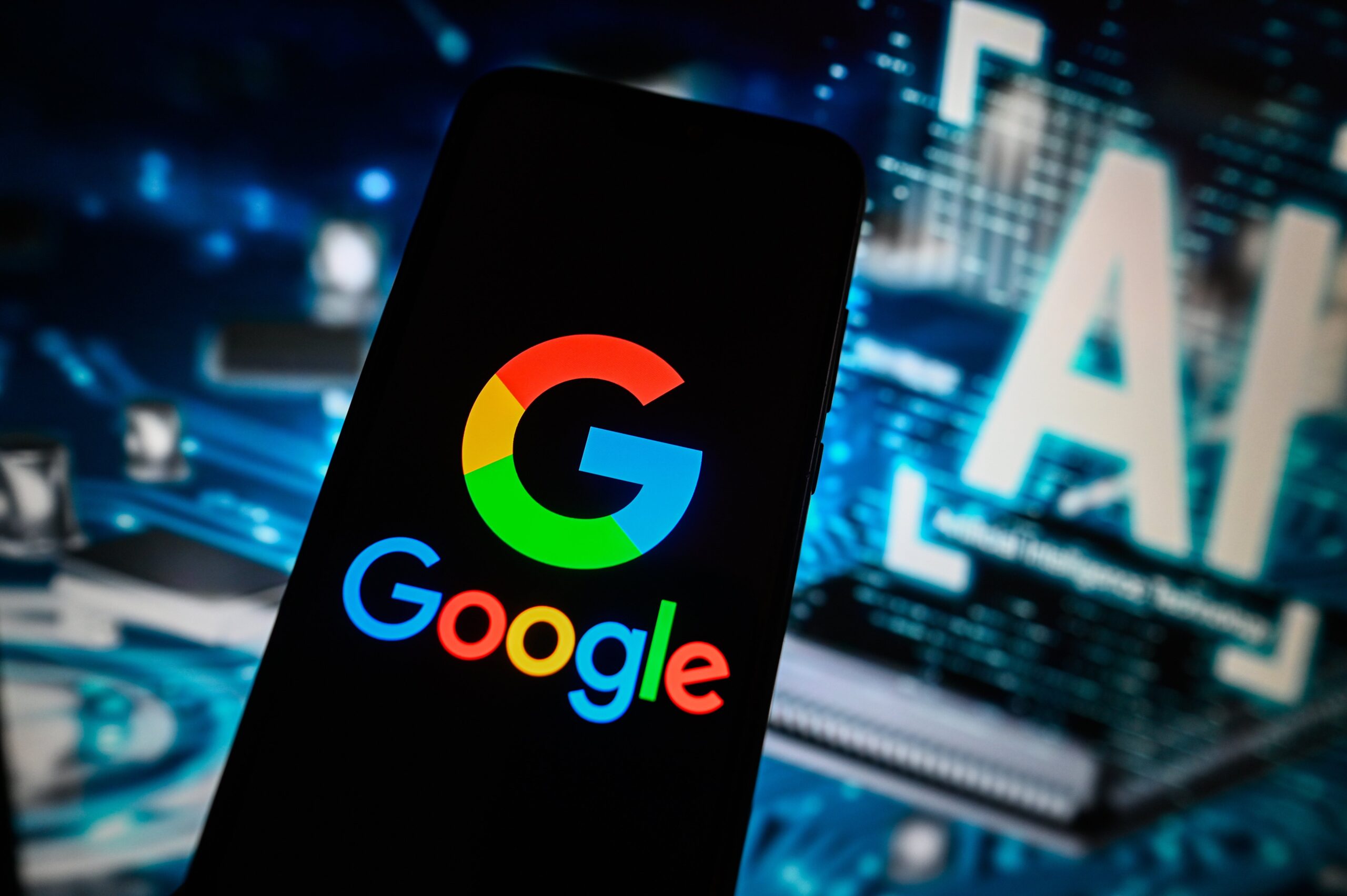 google logo on phone with ai lettering behind it