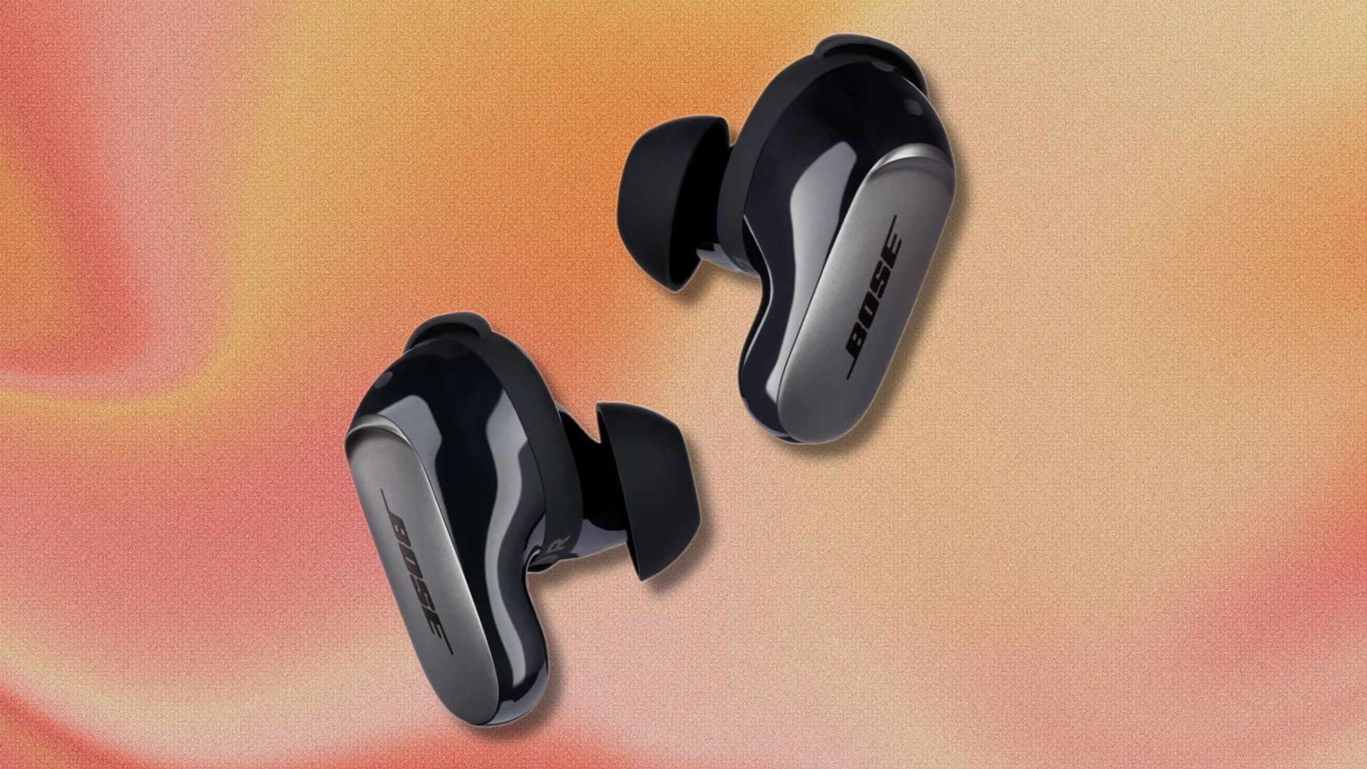 bose quietcomfort ultra earbuds on an orange and red swirling background