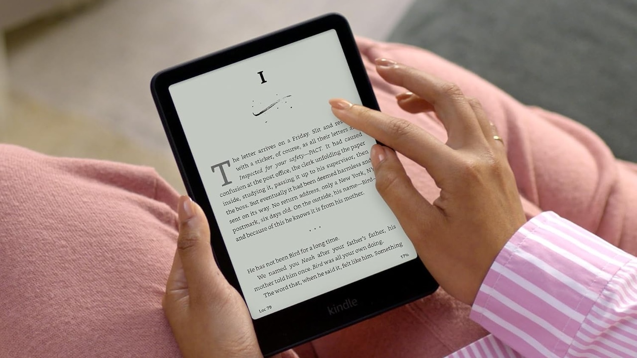 Person using Amazon Kindle tablet