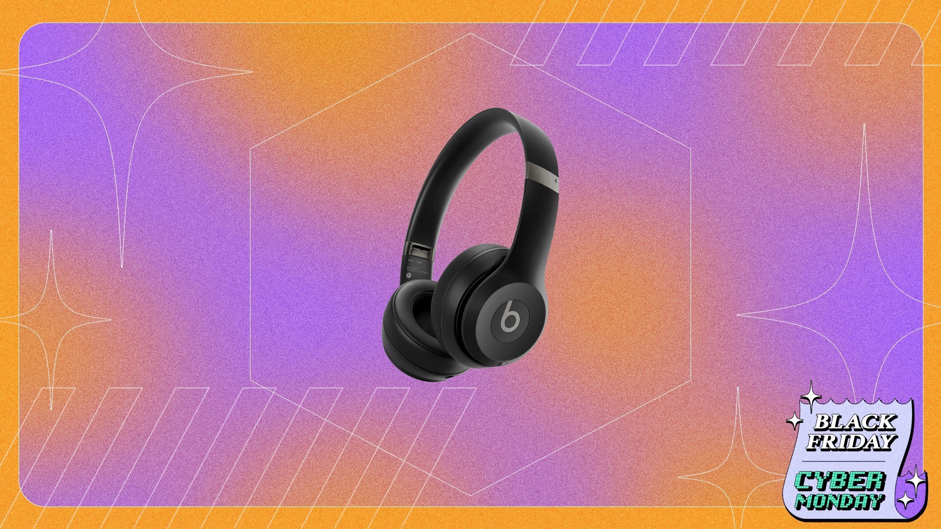 photo of black beats studio headphones. The background is an orange and purple gradient