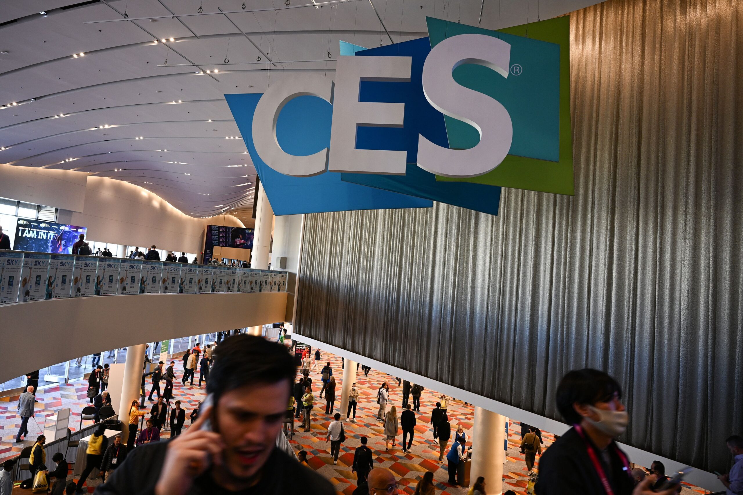 Attendees walk through the Consumer Electronics Show