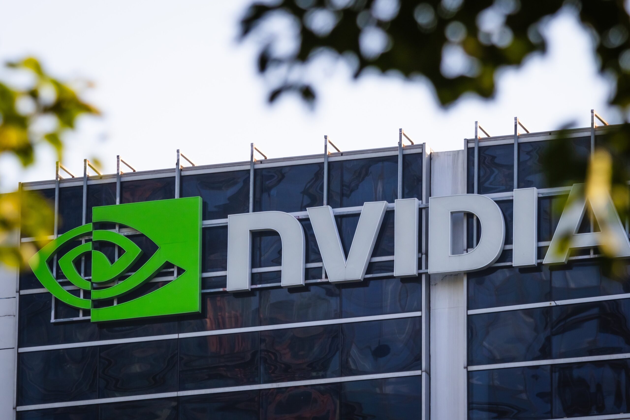 The Nvidia logo is seen on the exterior of an office building