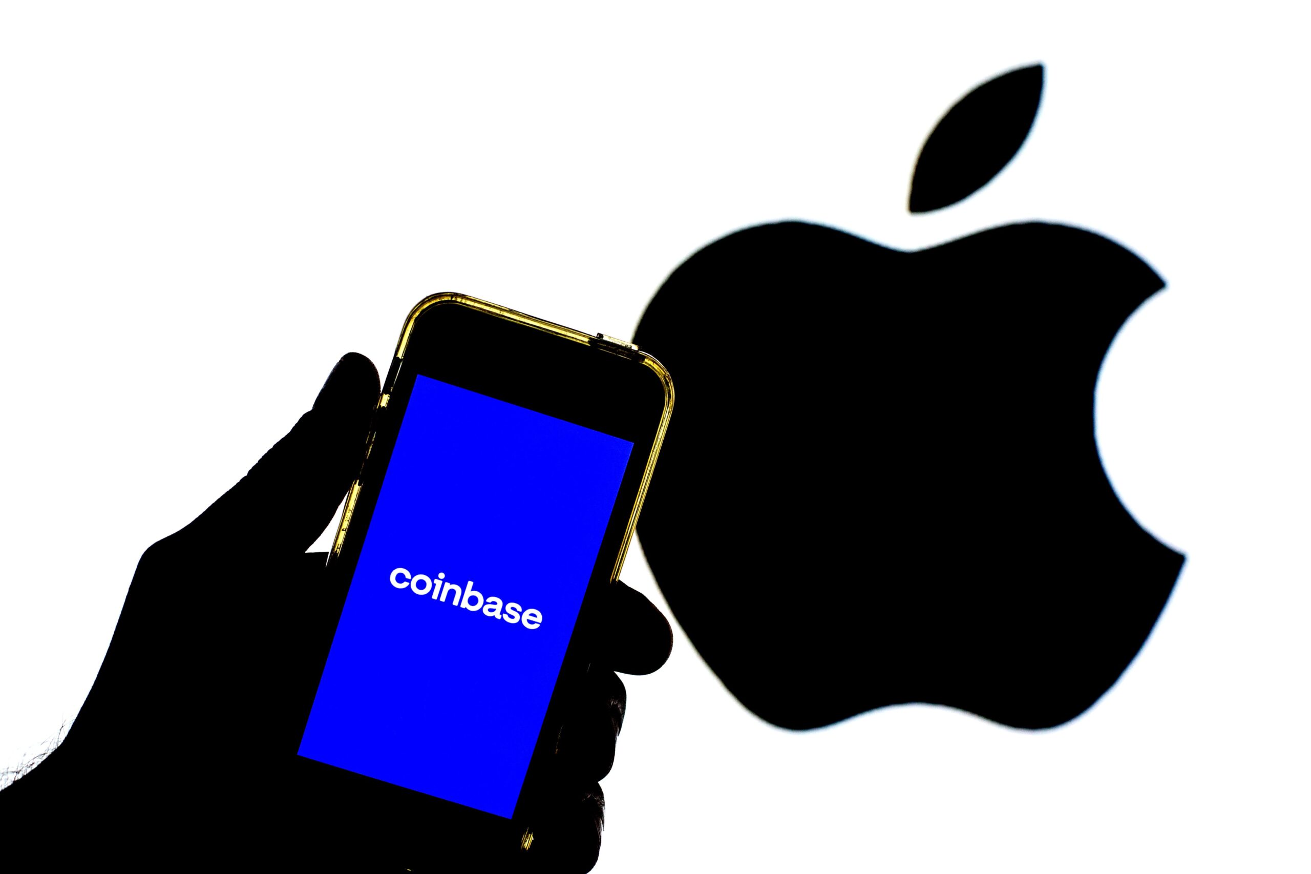 Coinbase on iPhone with Apple logo in the background