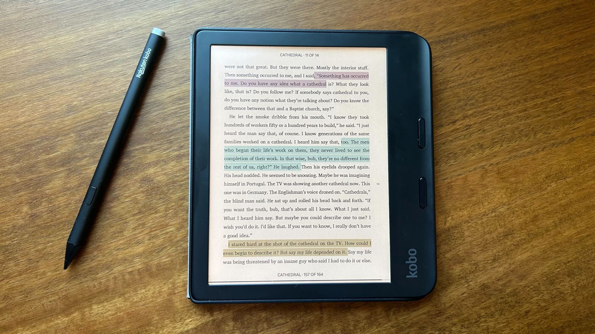 A Kobo Libra Colour with a Kobo stylus next to it