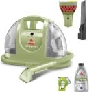 A Bissell Little Green Machine carpet cleaner