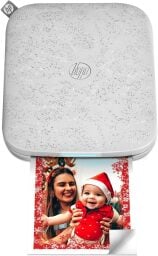HP Sprocket printer with image of mom and baby