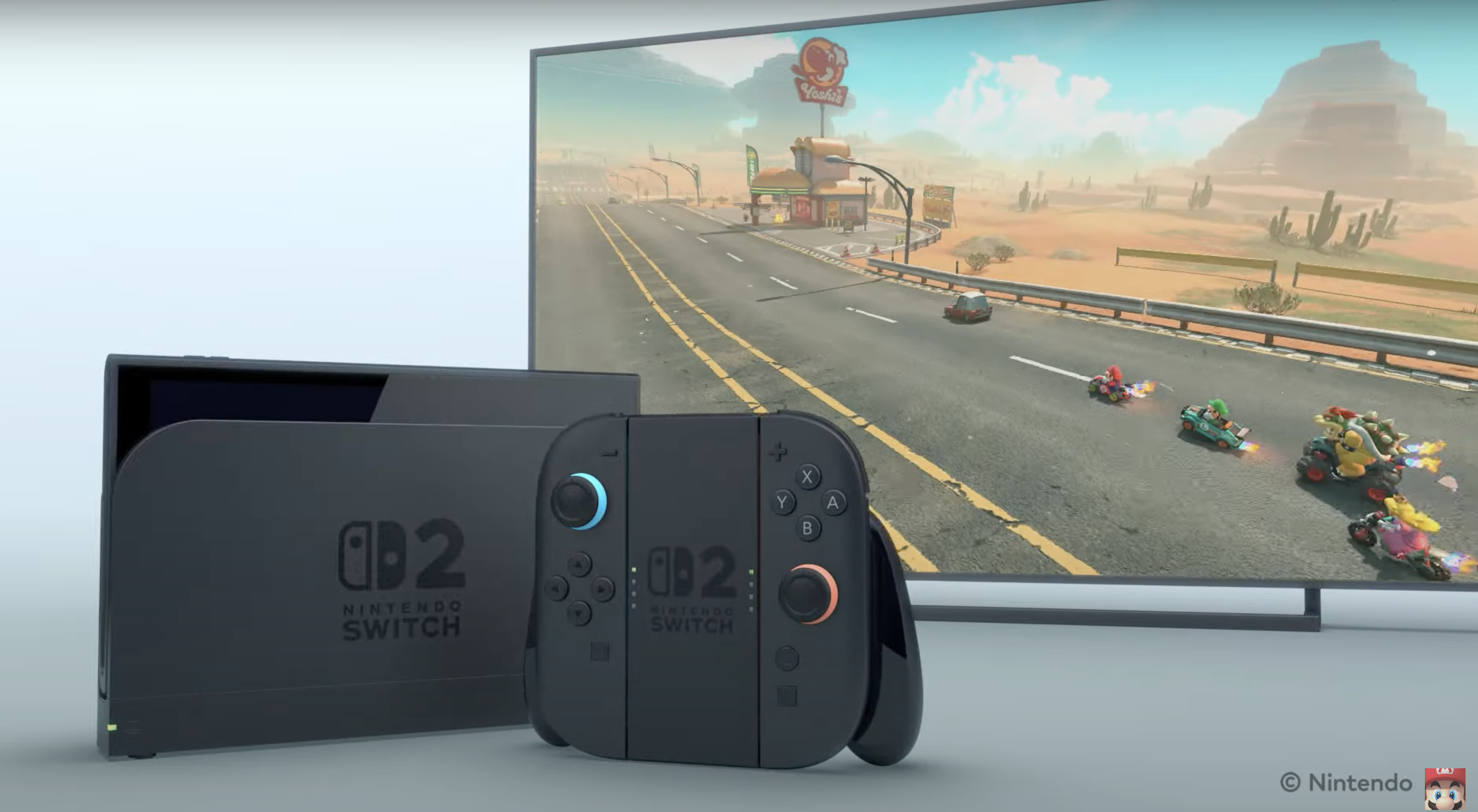 Two games consoles are visible side by side, next to some Mario Kart gameplay footage.