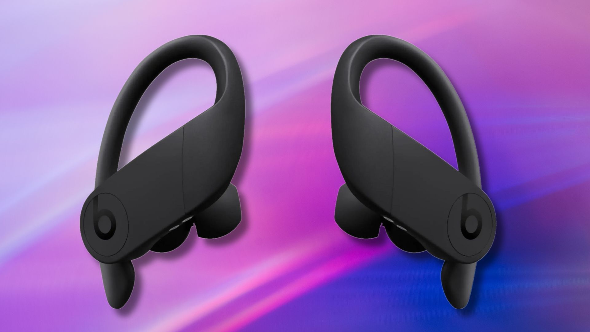 black beats powerbeats pro earbuds against a purple to blue gradient background