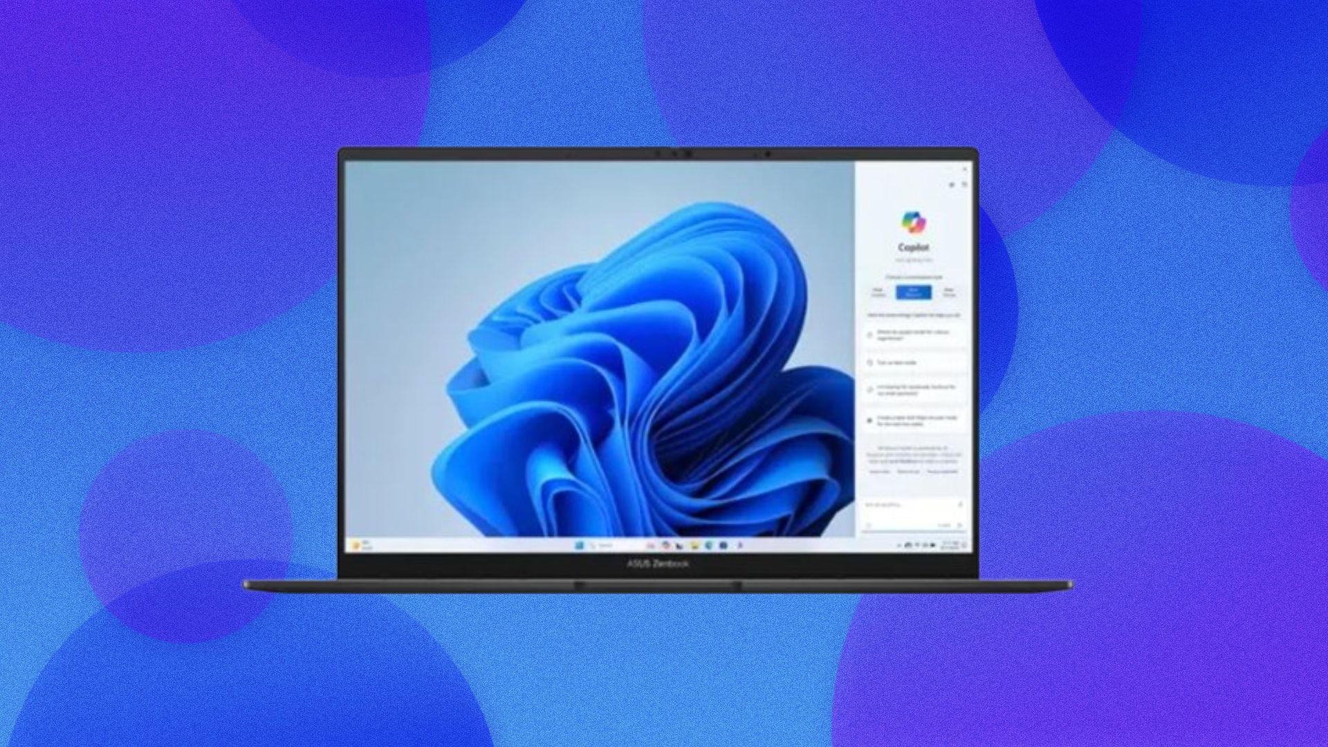 An Asus Zenbook laptop appears on an abstract bubble blue background with a plume of blue appearing on the screen.