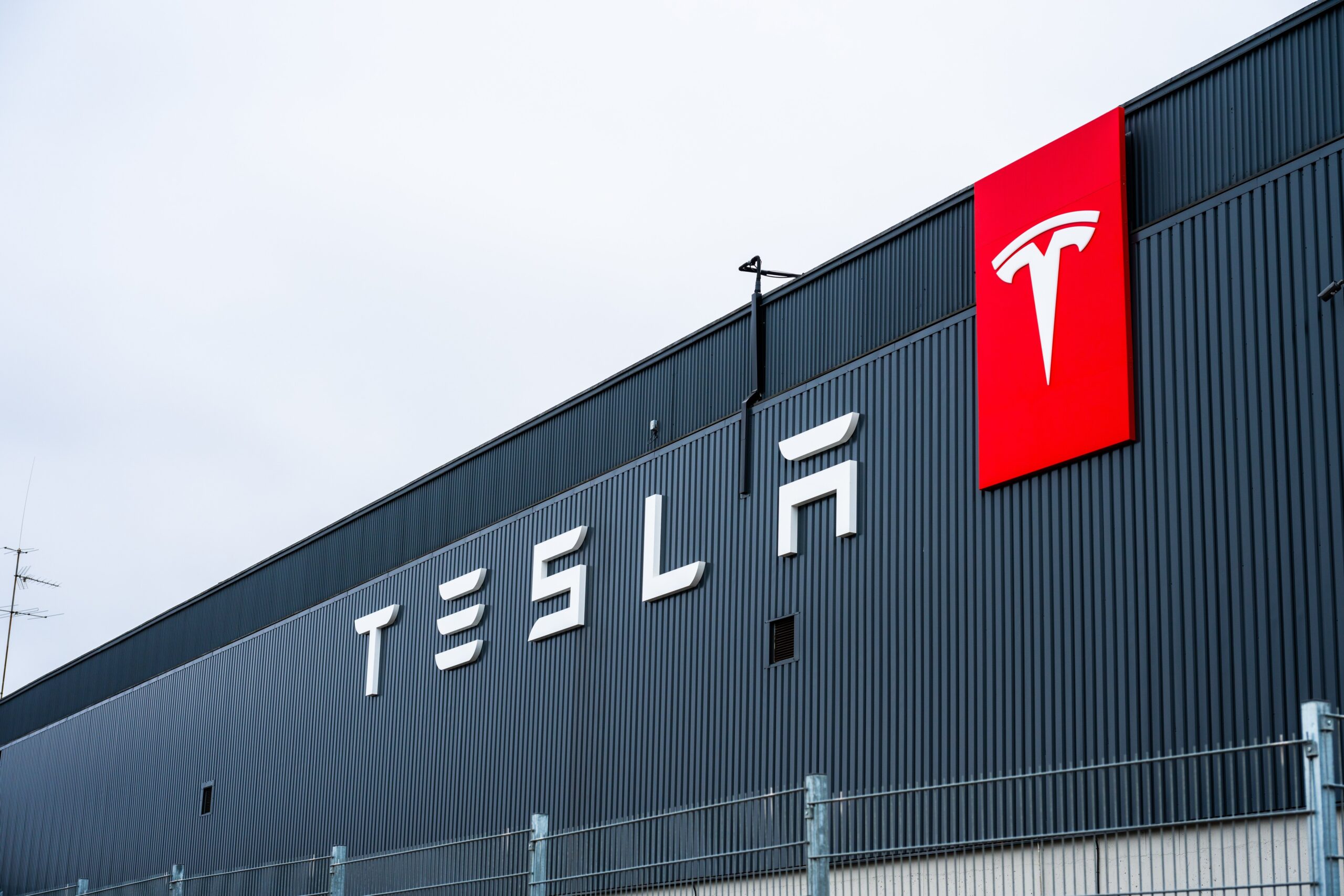  Tesla logo on the facade of a large factory