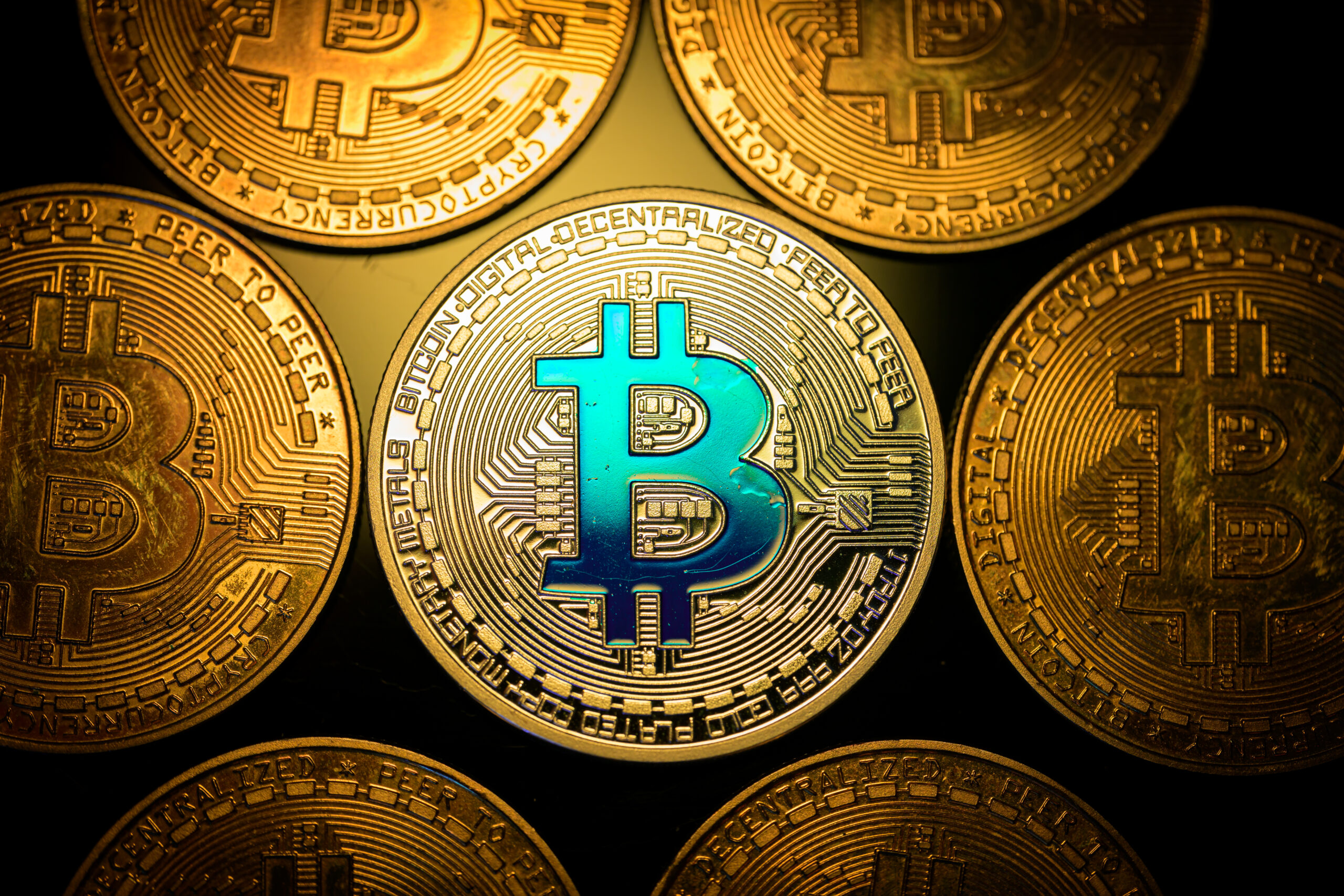 Coins with the bitcoin logo.