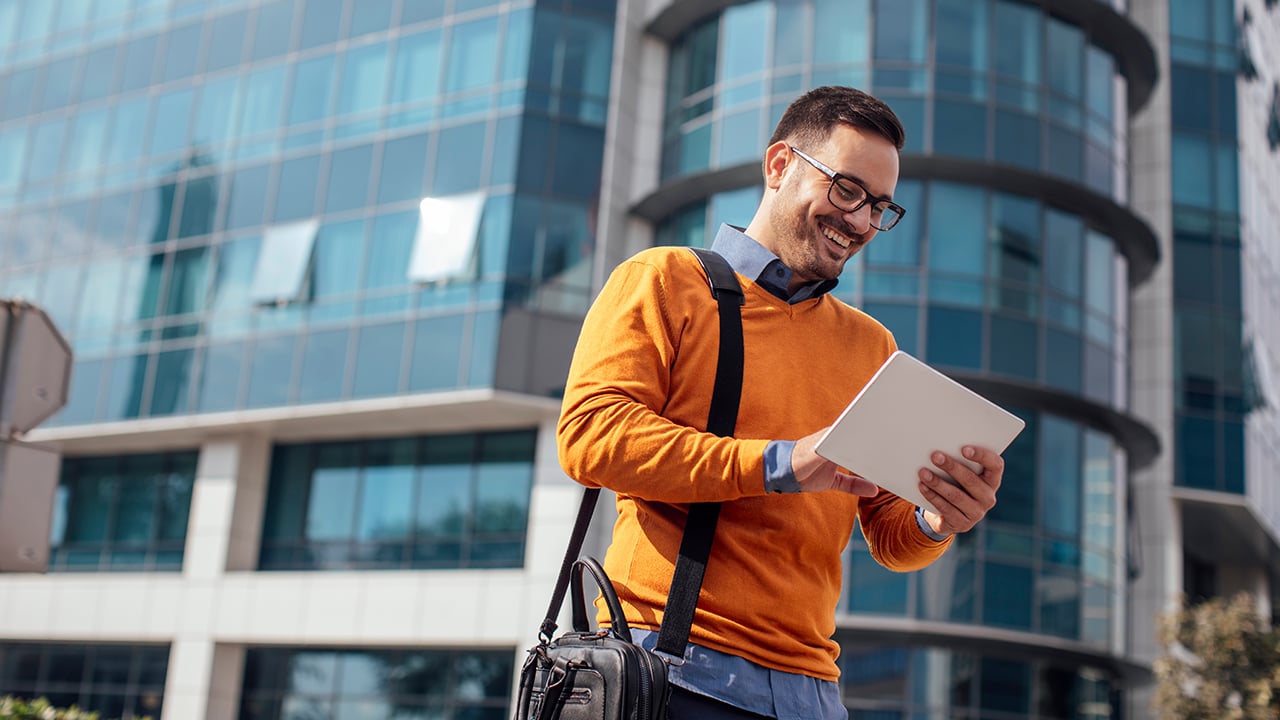 Man looking at tablet