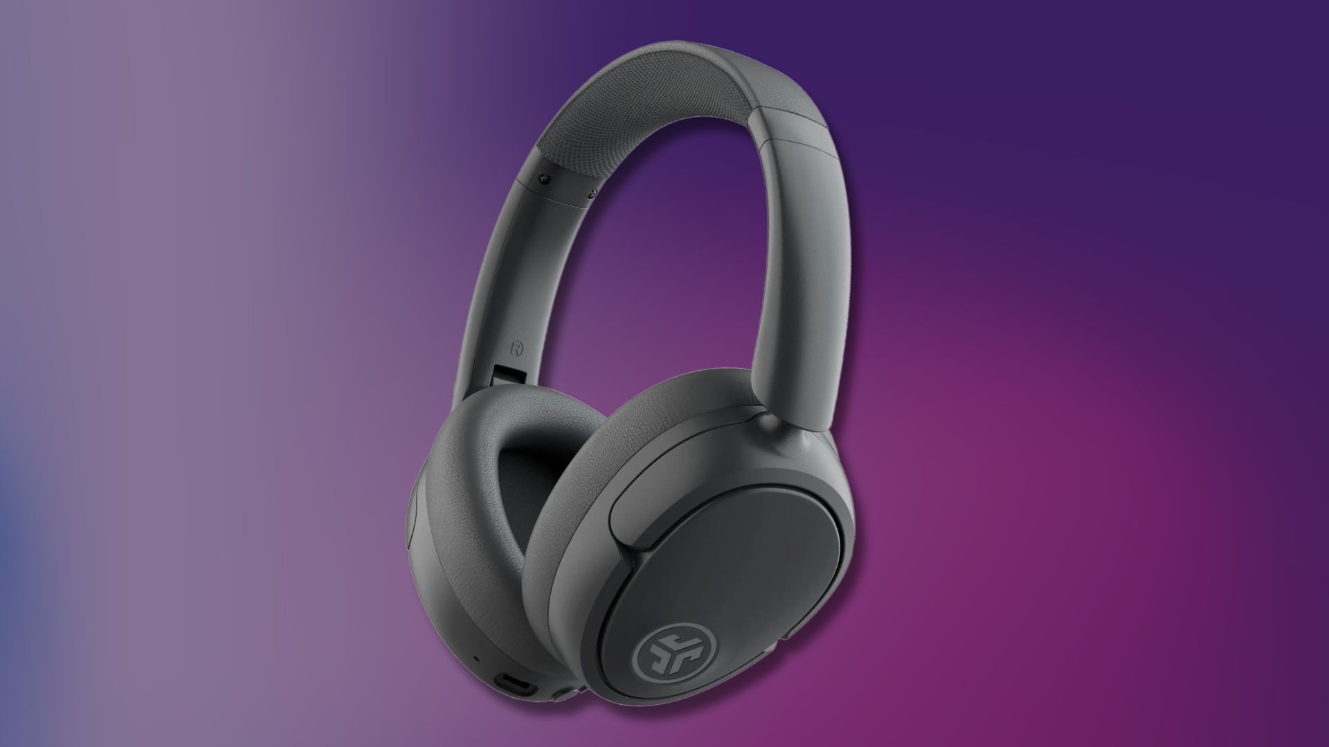 jlab jbuds lux anc headphones on a dark purple and pink gradient background