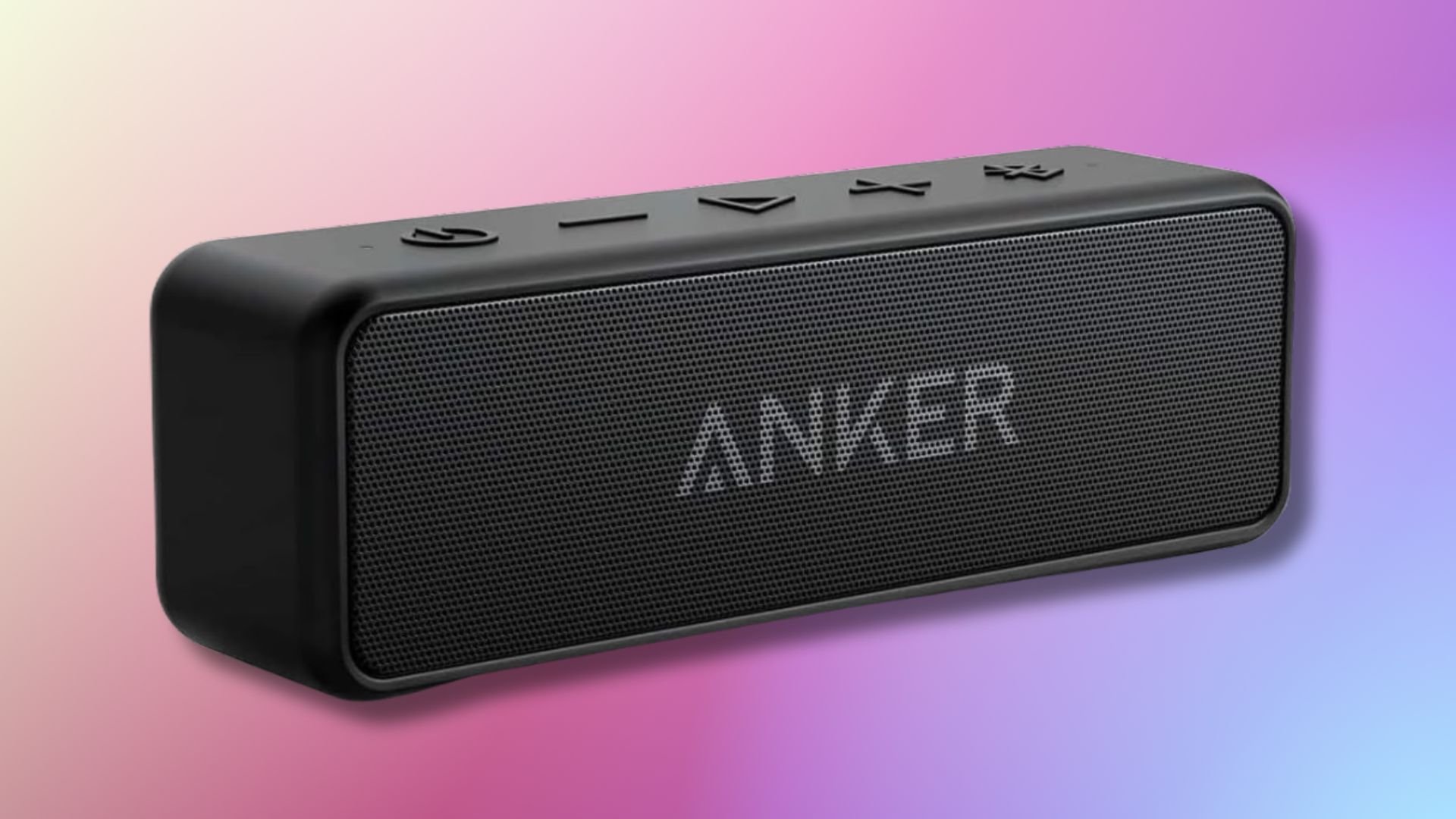 black anker soundcore 2 portable speaker on a pink, purple, and yellow gradient background