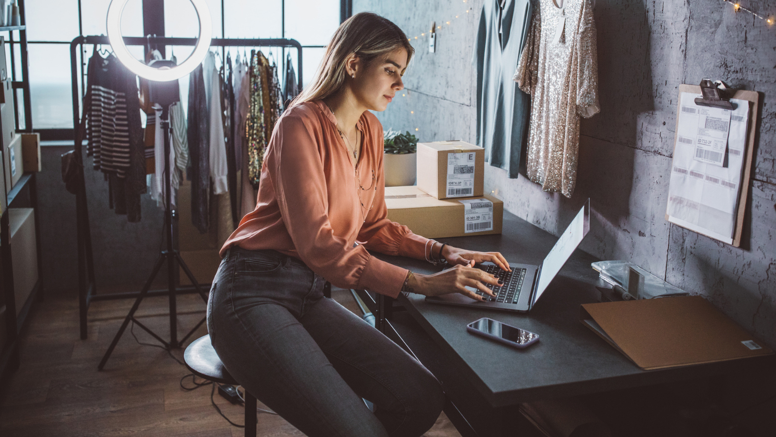 Young woman running online store - stock photo