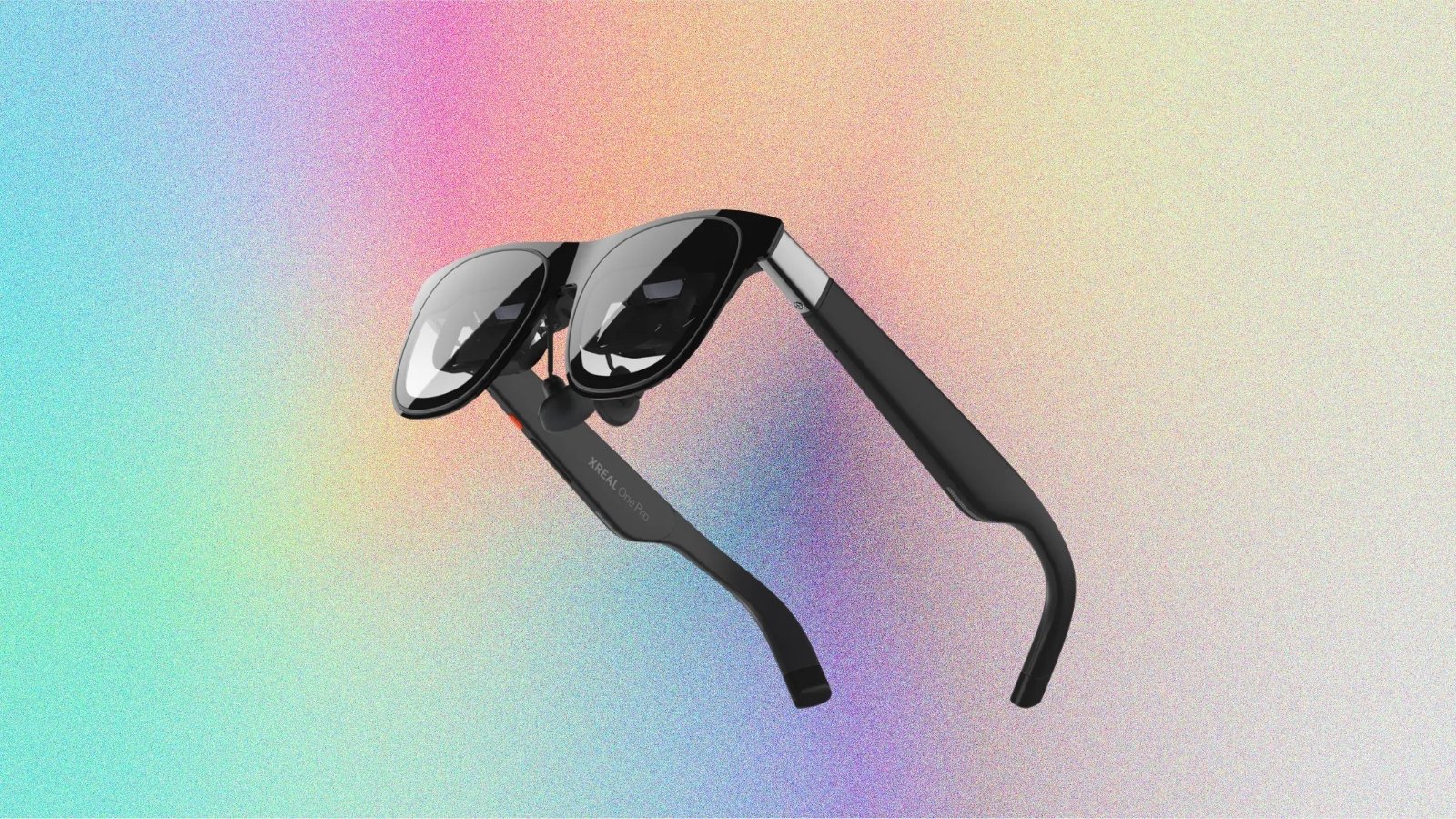 XREAL One Pro AR glasses on gradient background