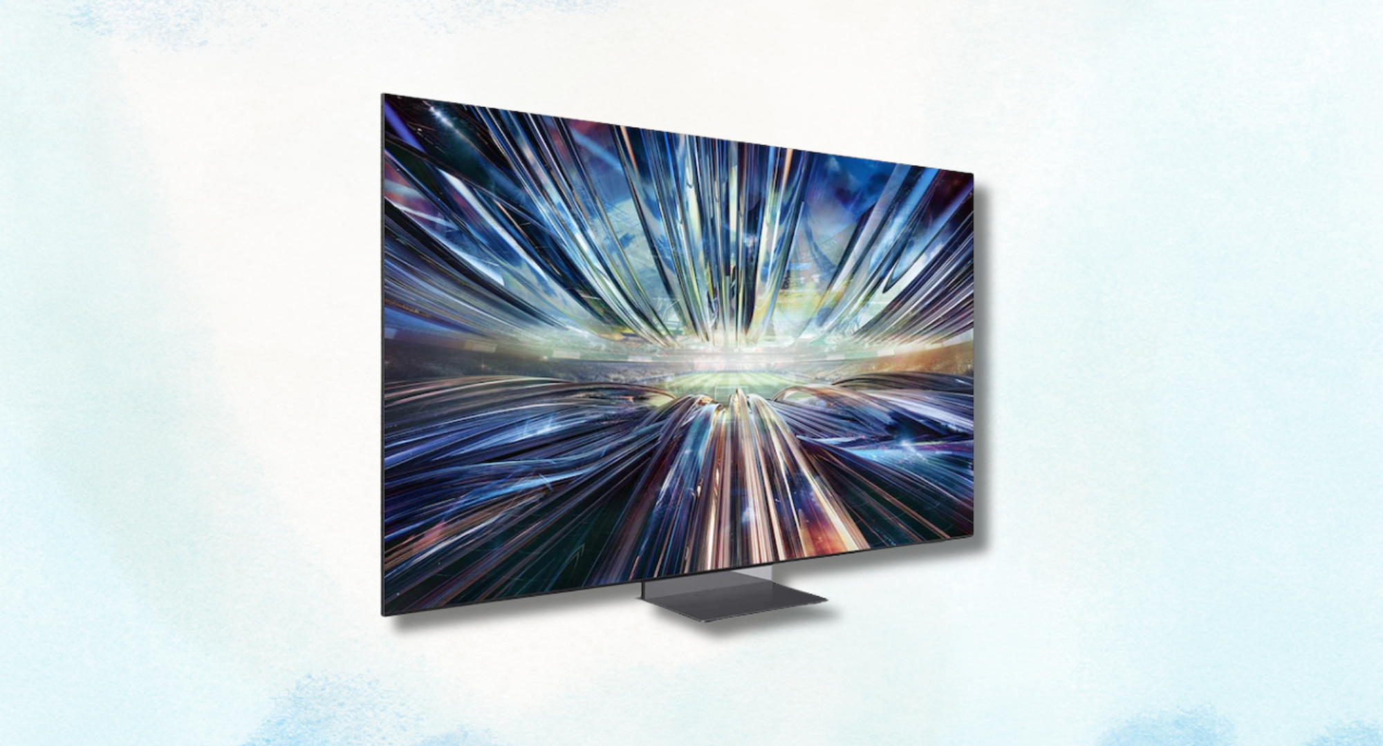 A sleek, modern Samsung TV displaying a vibrant abstract image of blue and purple lights swirling and exploding outwards.