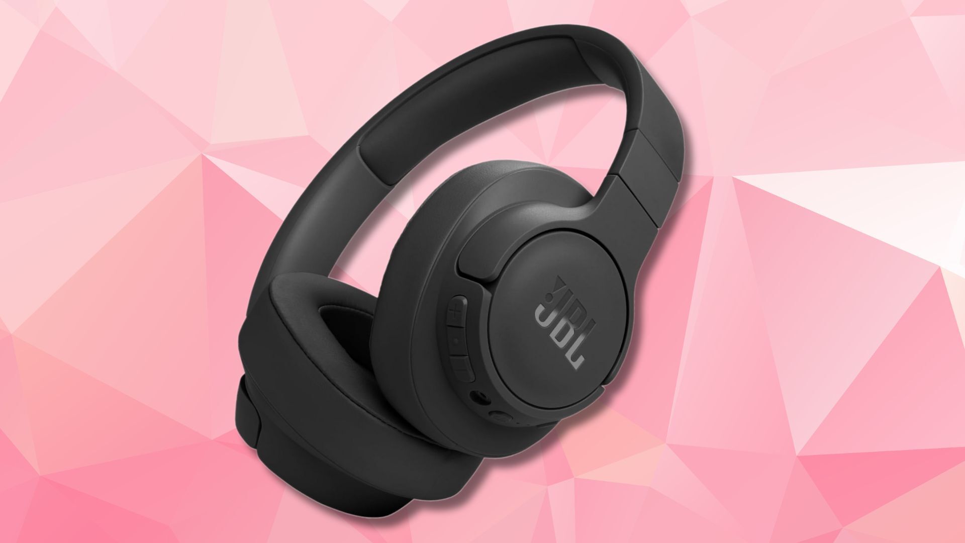 black jbl tune 770nc headphones on a pink geometric background