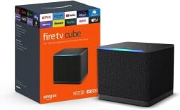 amazon fire tv cube box and speaker against a white background