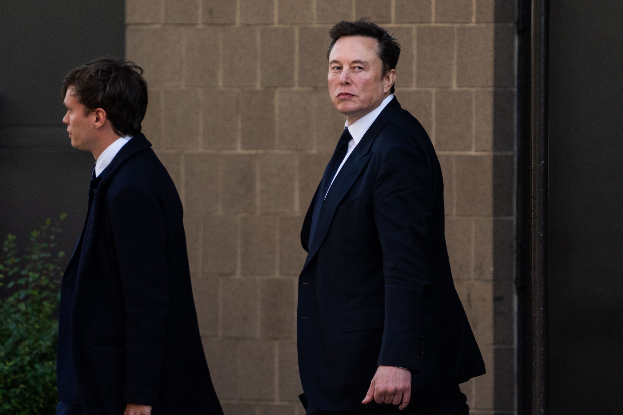 Elon Musk departs the Hyatt Regency Capitol Hill