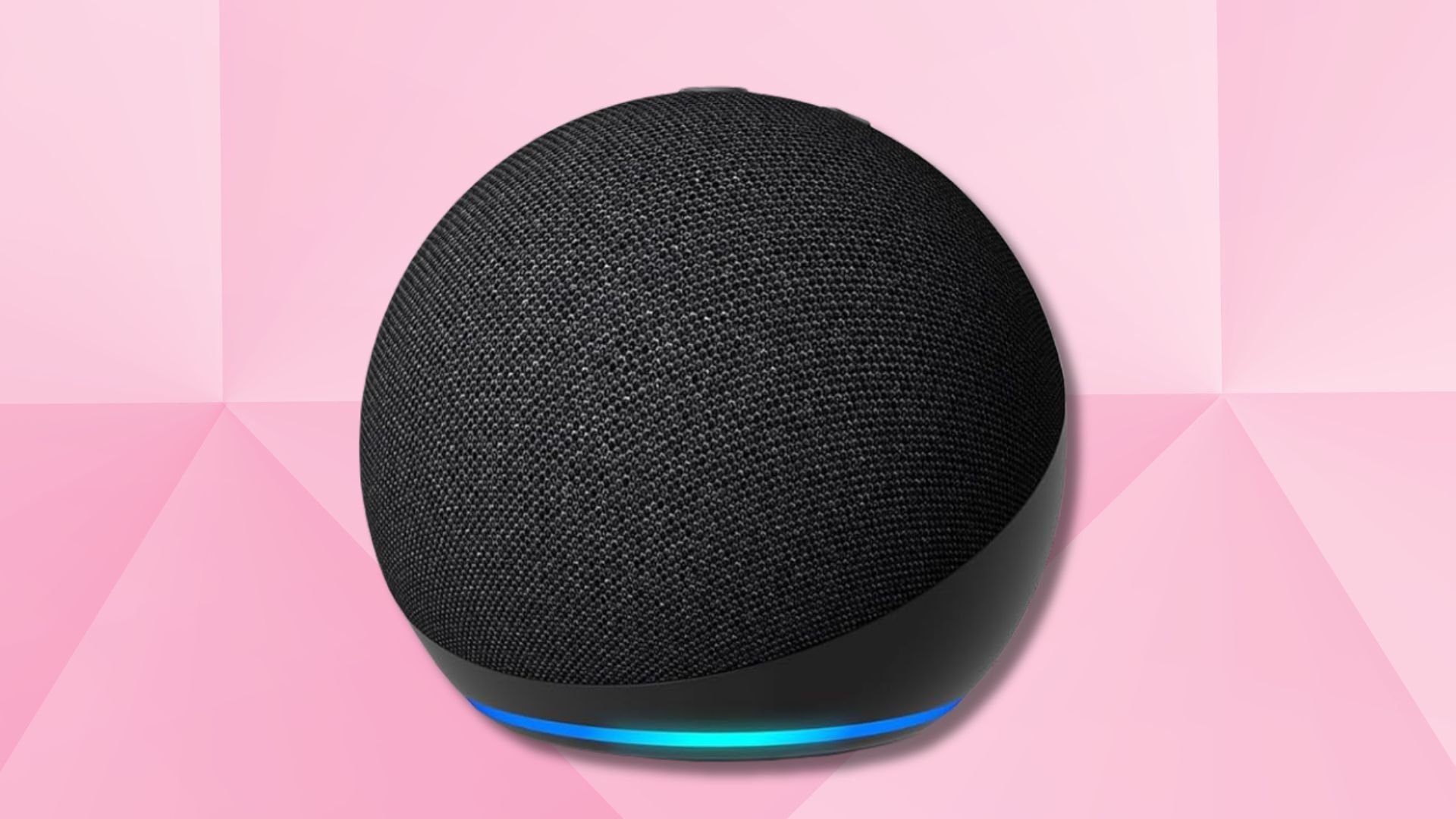 charcoal echo dot smart speaker against a pink geometric background