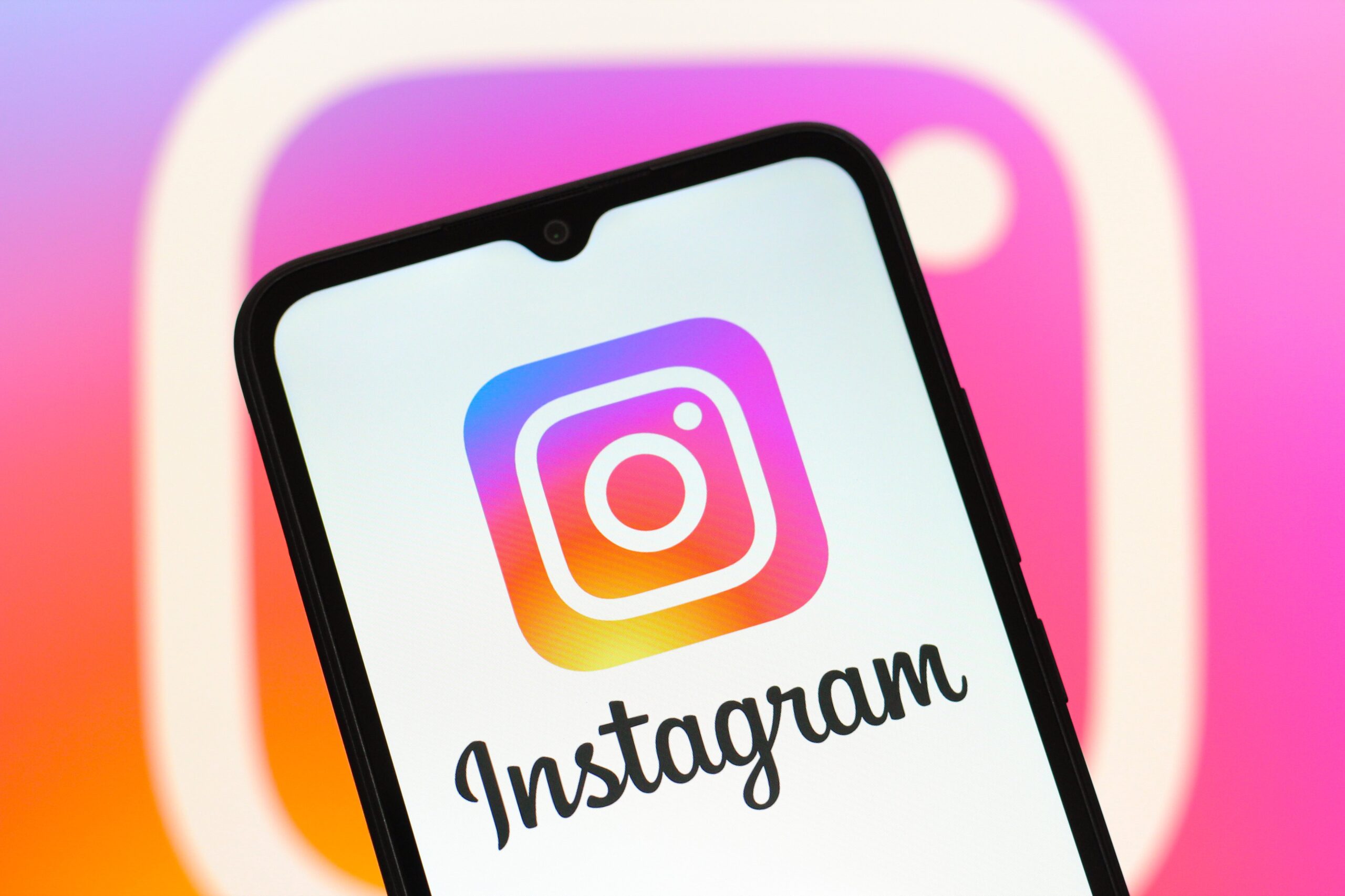 The Instagram logo displayed on a smartphone screen.