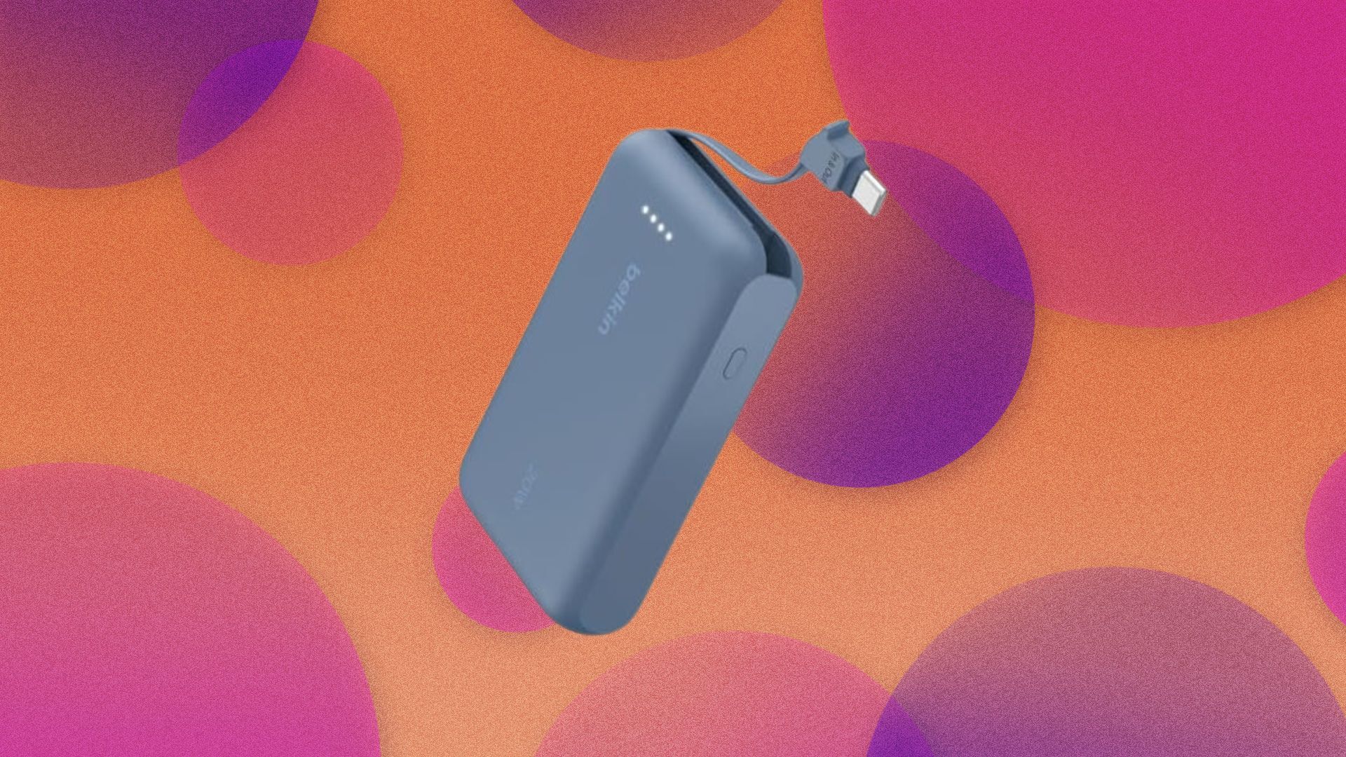 A Belkin powerbank appears on a bubbly pink background.