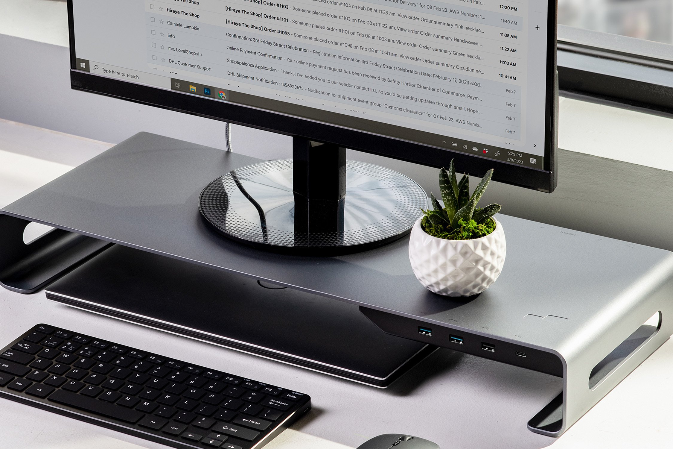 Aluminum Monitor Riser on desk with computer