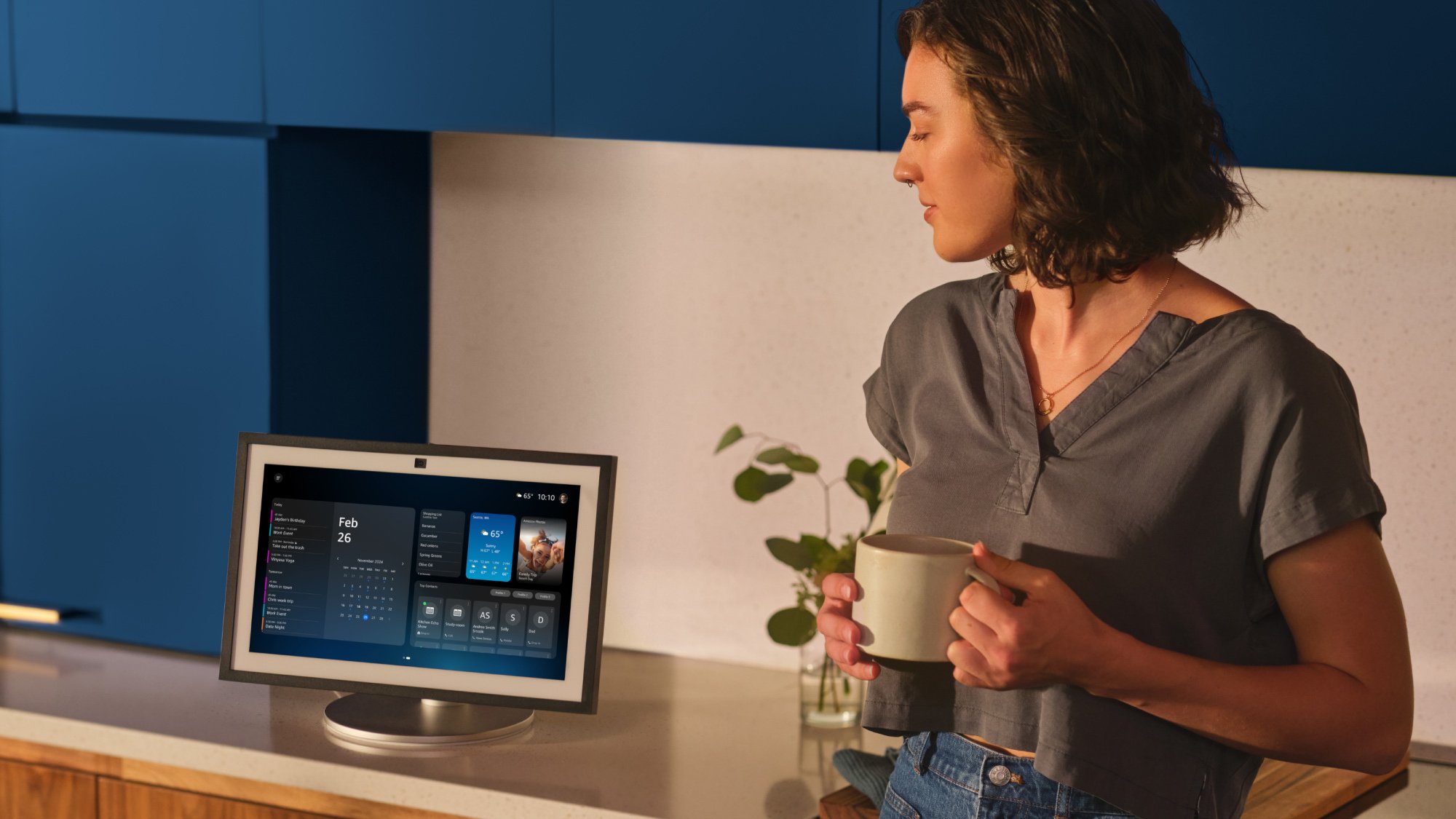 Woman standing next to an Echo device running Alexa+