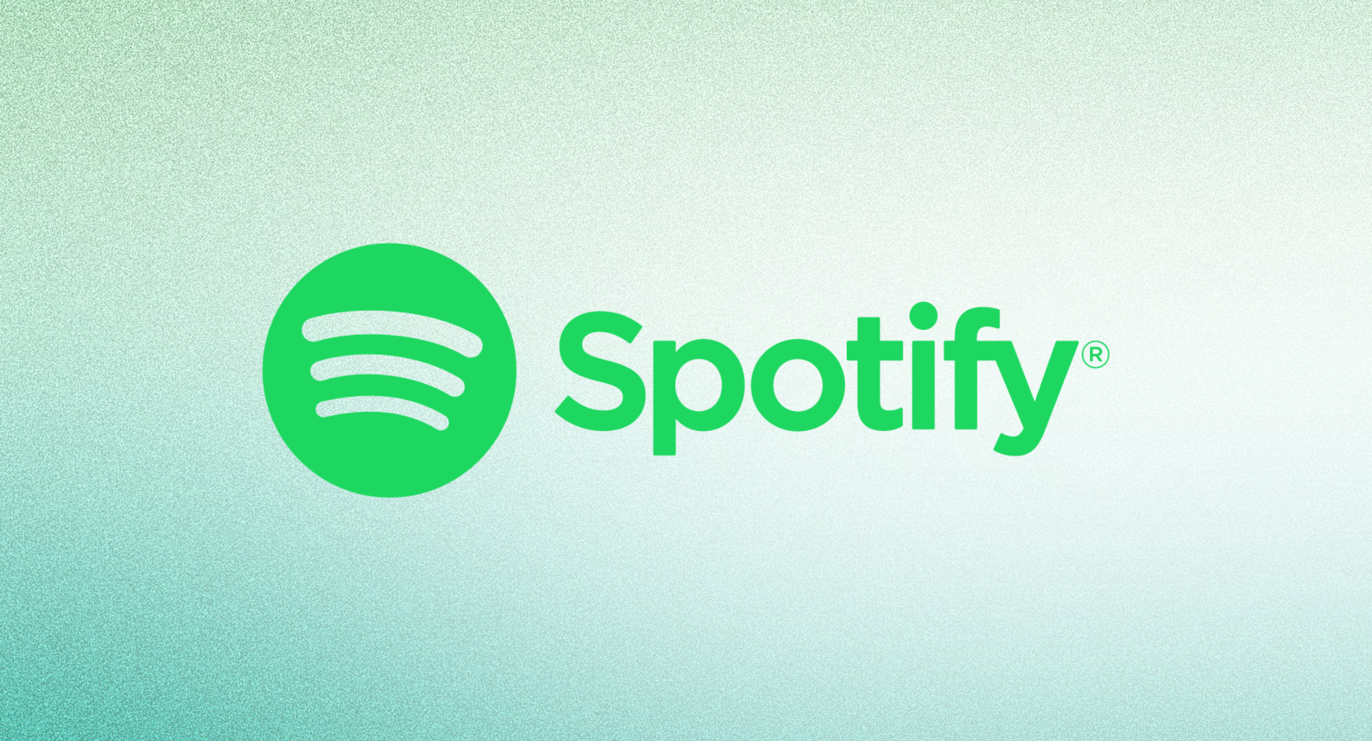 Spotify logo against a light green background. 