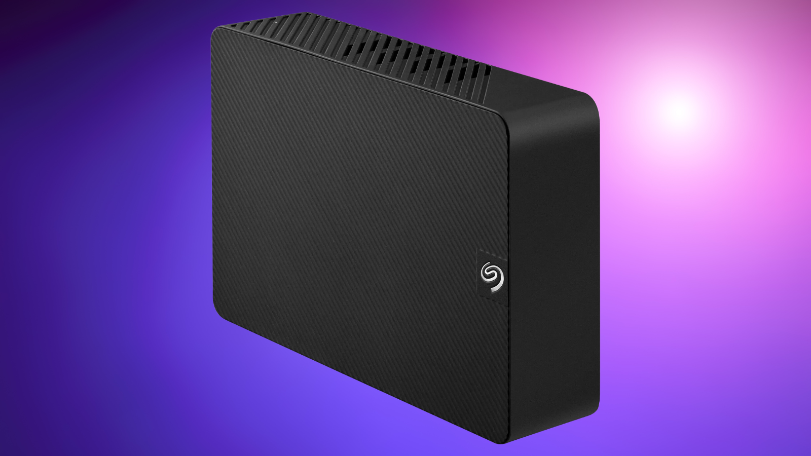 Seagate Expansion 20TB external hard drive on a purple gradient background