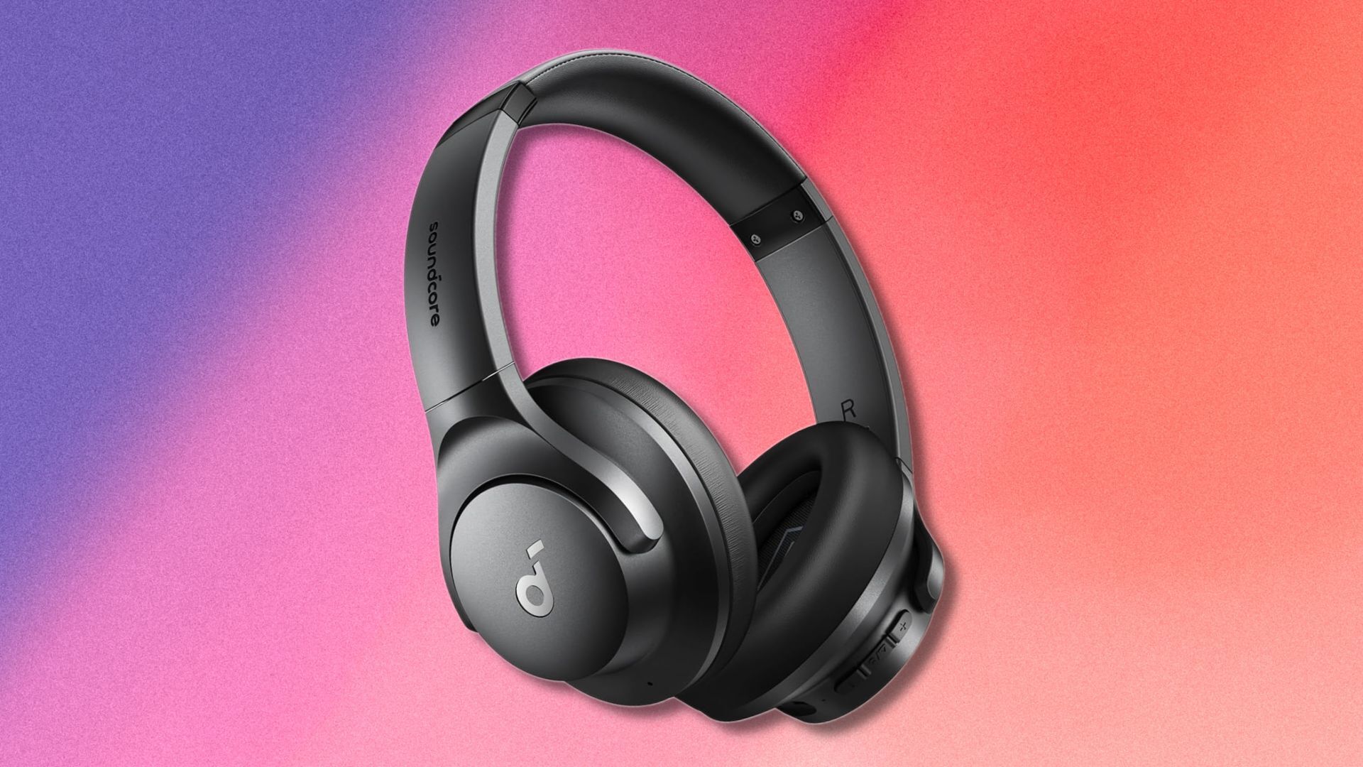 black soundcore by anker q20i headphones on a purple, pink, and orange gradient background